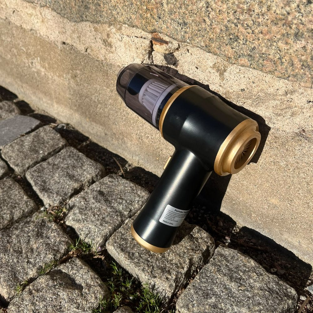 Ellorene bärbar dammsugare utomhus